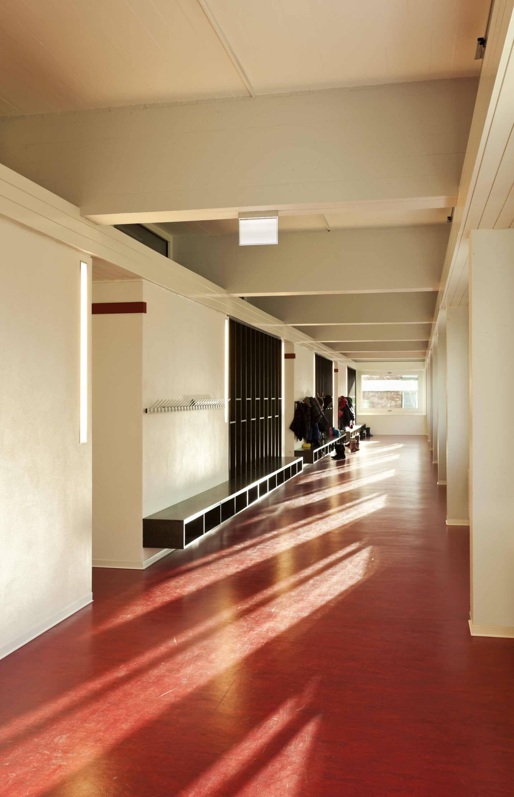 modern public school,  corridor red floor